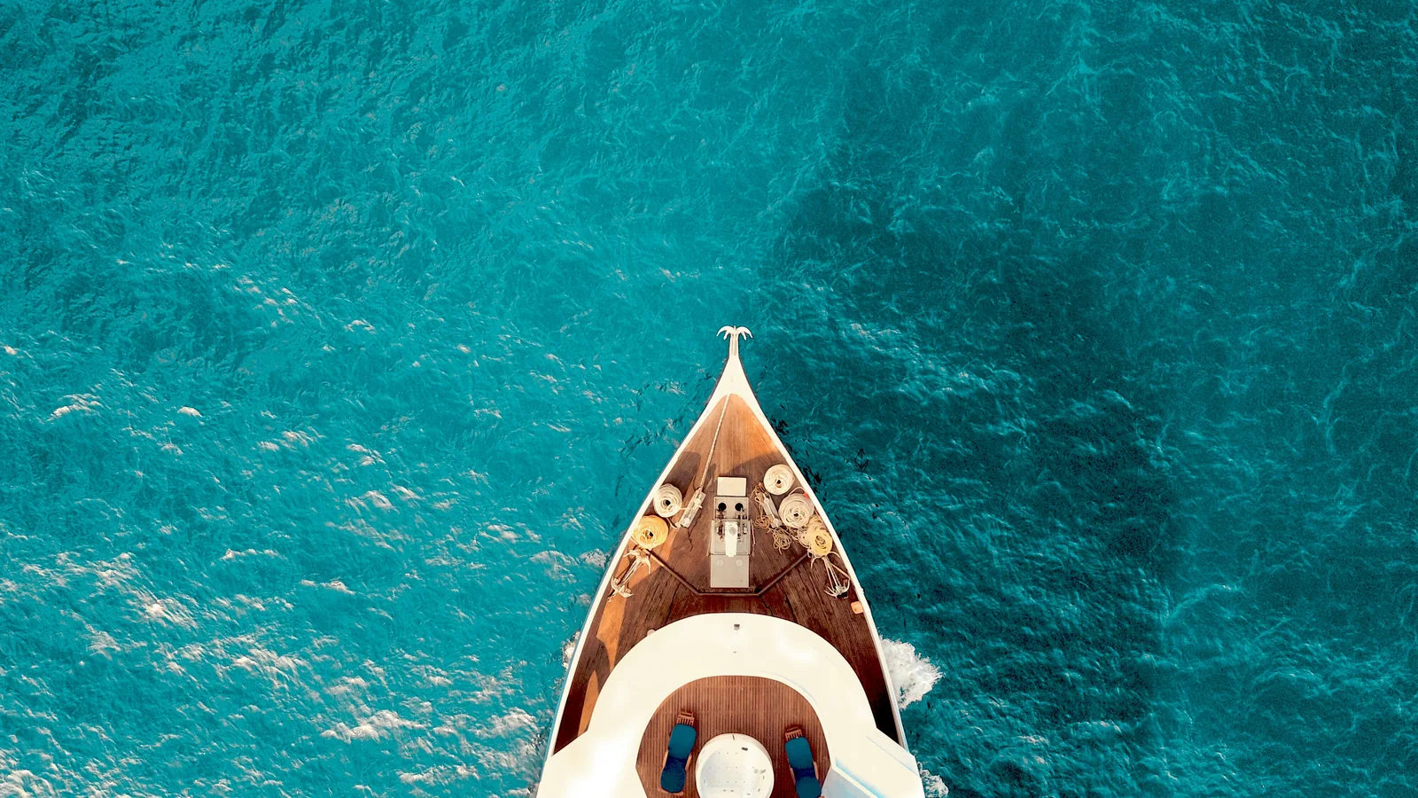Aerial view of a yacht on South Florida’s turquoise waters