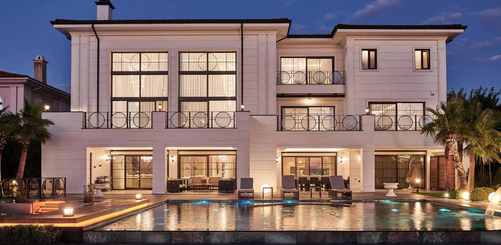 Luxury pool residence at dusk